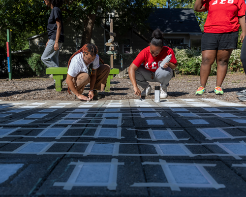 Students helping on campus.